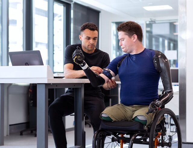 Male mechanical engineer fits prosthetic limbs